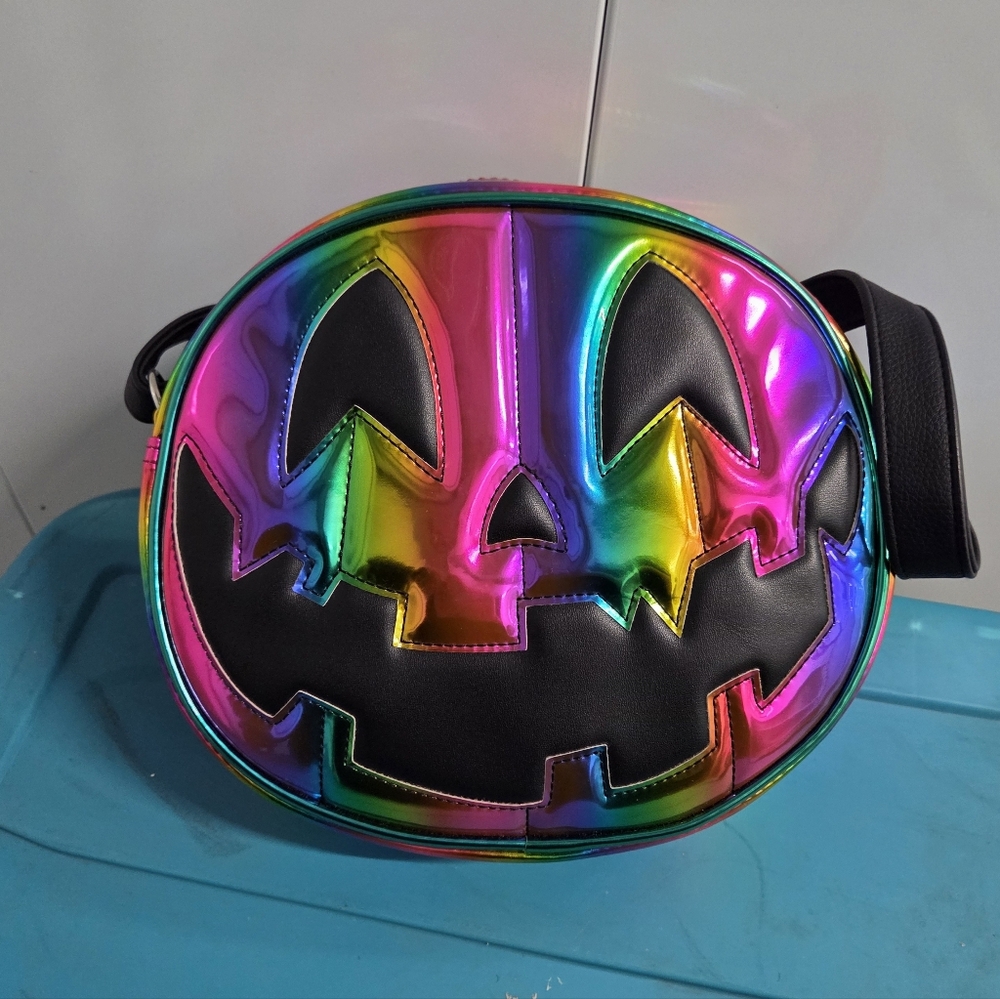 Love Pain And Stitches Jack-o-lantern purse in rainbow vinyl double sided face